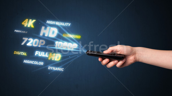 Kéz távirányító multimédia tart ki technológia Stock fotó © ra2studio