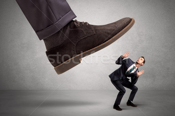 Employee afraid of the big boss foot Stock photo © ra2studio