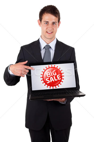 Business man pointing at a colorful sale label 3 Stock photo © ra2studio
