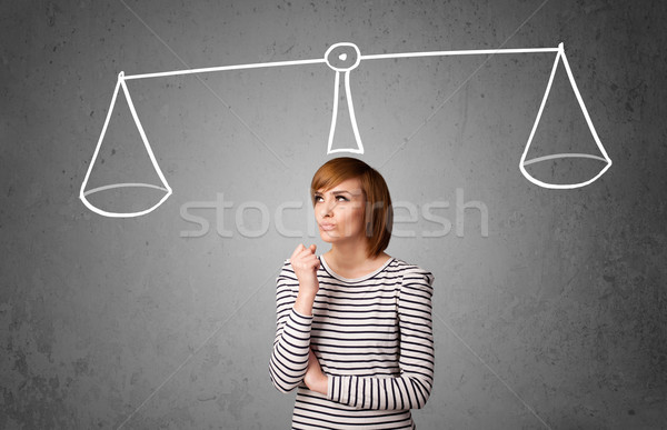 Young woman taking a decision Stock photo © ra2studio