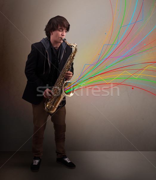 Foto stock: Atractivo · músico · jugando · saxófono · colorido · resumen