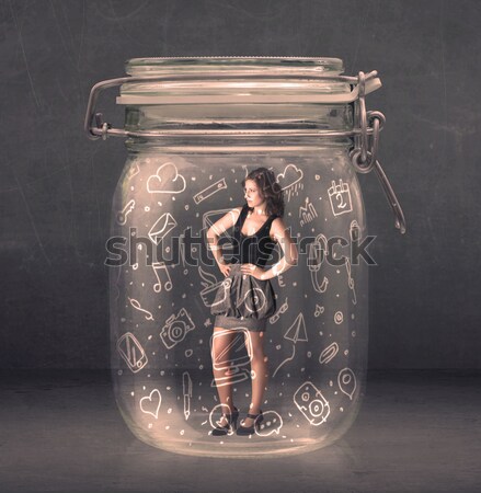 Business woman captured in glass jar with hand drawn media icons Stock photo © ra2studio