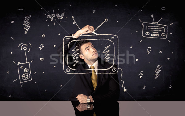 Happy businessman drawing tv and radio Stock photo © ra2studio