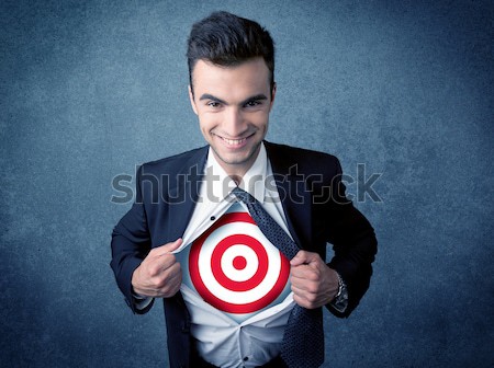 Businessman tearing shirt with target sign on his chest Stock photo © ra2studio