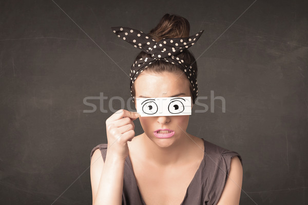 Funny woman looking with hand drawn paper eyes Stock photo © ra2studio