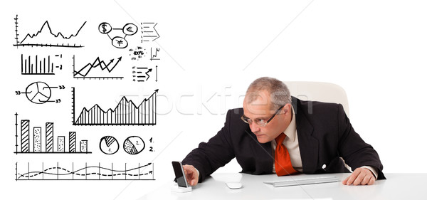 Stockfoto: Zakenman · vergadering · bureau · diagrammen · grafieken · geïsoleerd