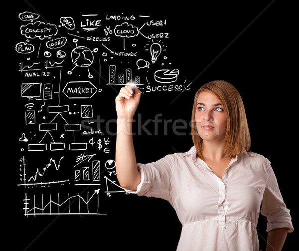 Woman drawing business scheme and icons on whiteboard Stock photo © ra2studio