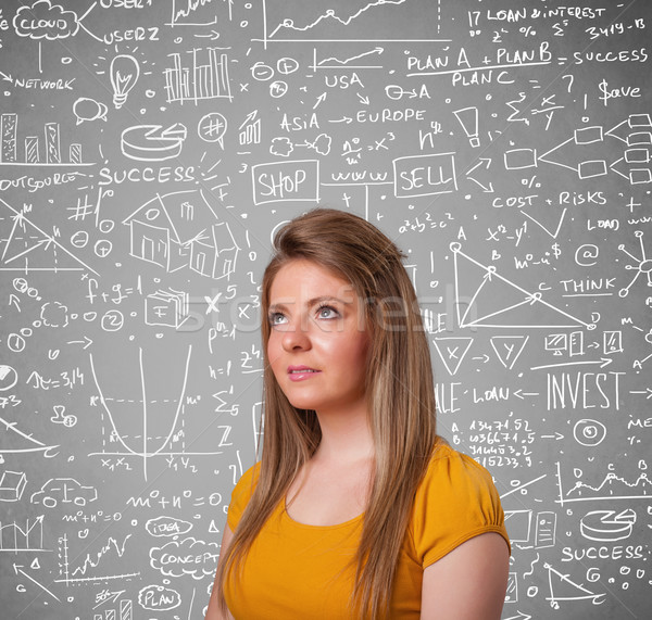 Young pretty lady with hand drawn calculations and icons Stock photo © ra2studio