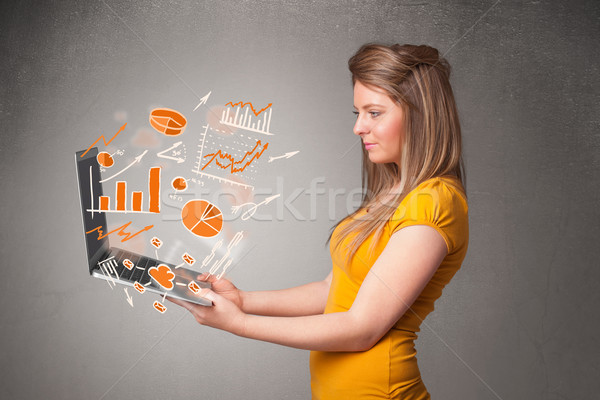 Stock photo: Beautiful lady holding notebook with graphs and statistics