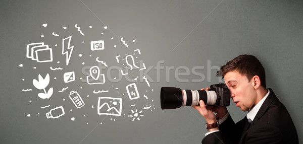 Photographer boy capturing white photography icons and symbols Stock photo © ra2studio