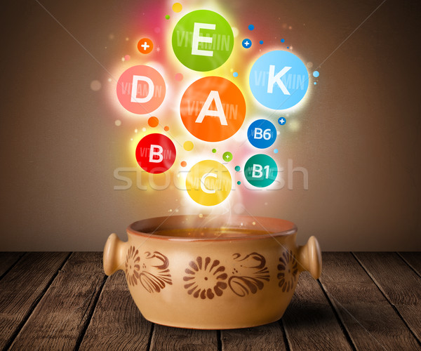 Food plate with delicious meal and healthy vitamin symbols Stock photo © ra2studio