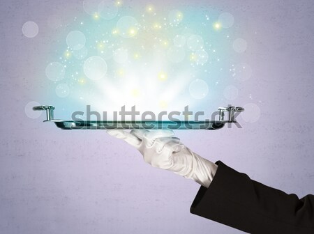 Worker with airbrush and colorful abstract clouds and balloons Stock photo © ra2studio