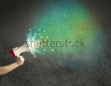 Stock photo: Worker with airbrush gun painting hand drawn car lines