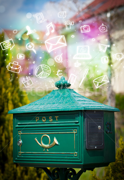 Stock photo: Colorful icons and symbols bursting out of a mailbox