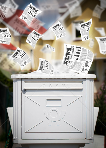 Post box with daily newspapers flying Stock photo © ra2studio