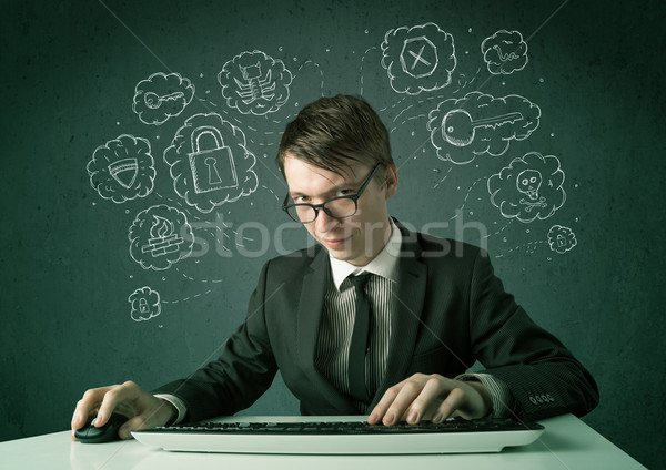 Young nerd hacker with virus and hacking thoughts Stock photo © ra2studio