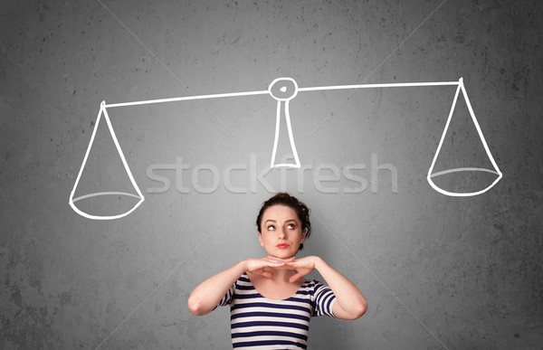 Young woman taking a decision Stock photo © ra2studio