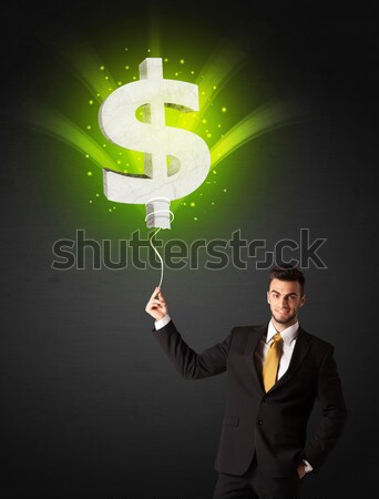 Stock fotó: üzletember · dollárjel · léggömb · tart · ragyogó · zöld