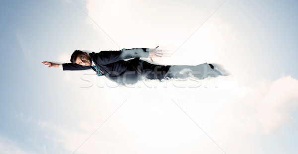 Foto stock: Hombre · de · negocios · vuelo · como · nubes · cielo