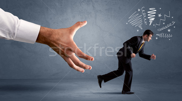 Stresszes üzletember fut nagy kéz iroda Stock fotó © ra2studio