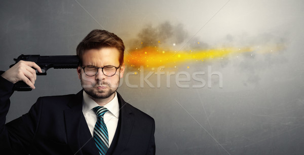 Gone businessman shooting his head with gun Stock photo © ra2studio