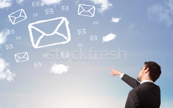 Foto stock: Empresário · olhando · e-mail · símbolo · nuvens · blue · sky