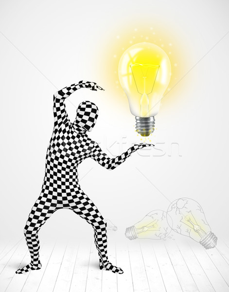 Man in full body with glowing light bulb Stock photo © ra2studio