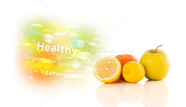 Colorful juicy fruits with healthy text and signs  Stock photo © ra2studio