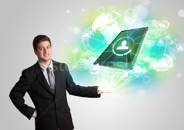 Business man showing modern tablet technology concept Stock photo © ra2studio