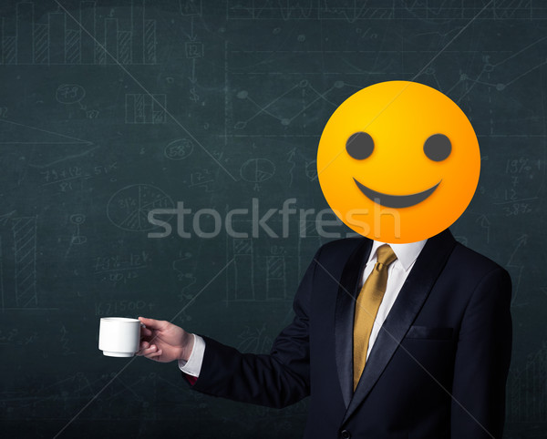 businessman wears yellow smiley face Stock photo © ra2studio