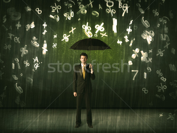 Businessman standing with umbrella and 3d numbers raining concep Stock photo © ra2studio