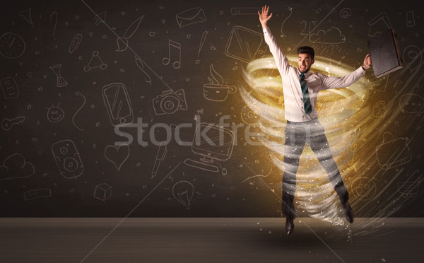 Happy businessman jumping in tornado concept Stock photo © ra2studio