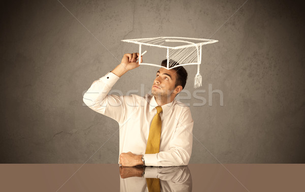 Happy college graduate drawing academic hat Stock photo © ra2studio