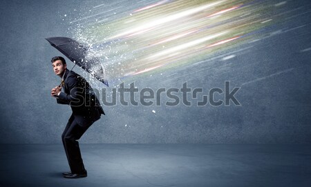 Homme d'affaires lumière parapluie affaires eau mur [[stock_photo]] © ra2studio