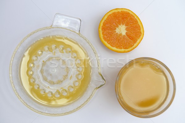orange juice and squeezer Stock photo © rabel