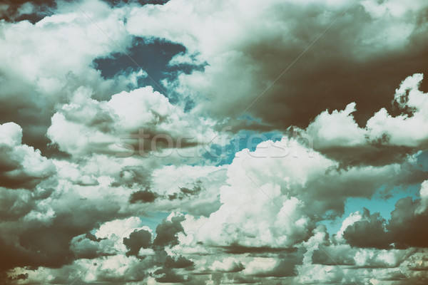White Cumulus Clouds And Grey Storm Clouds Gathering On Blue Sky Stock photo © radub85