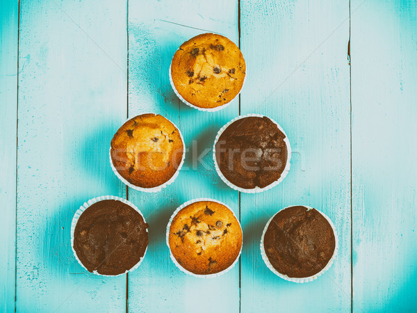 Homemade Chocolate Chip Muffins On Blue Table Stock photo © radub85