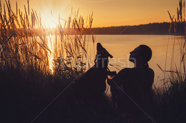 Amis coucher du soleil homme chien marche lac [[stock_photo]] © raduga21