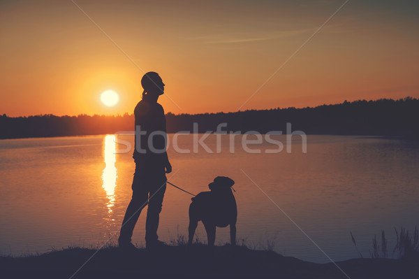 Amis coucher du soleil homme chien marche lac [[stock_photo]] © raduga21