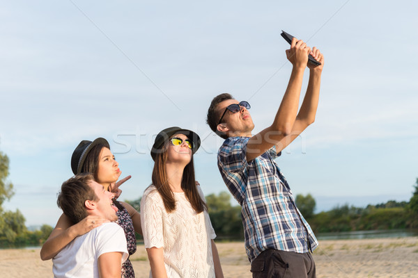 Group Of Young Adult Friends Taking Selfie Stock photo © rafalstachura