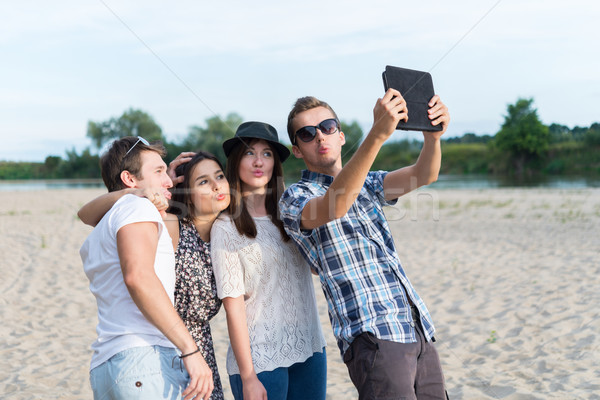 Group Of Young Adult Friends Taking Selfie Stock photo © rafalstachura