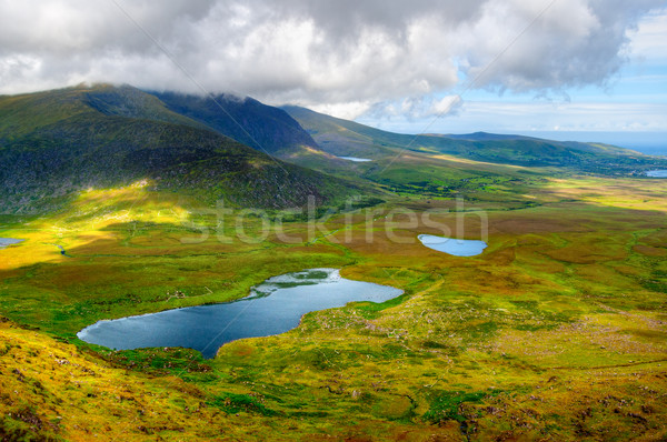 Península ensolarado montanha lago paisagem Foto stock © rafalstachura