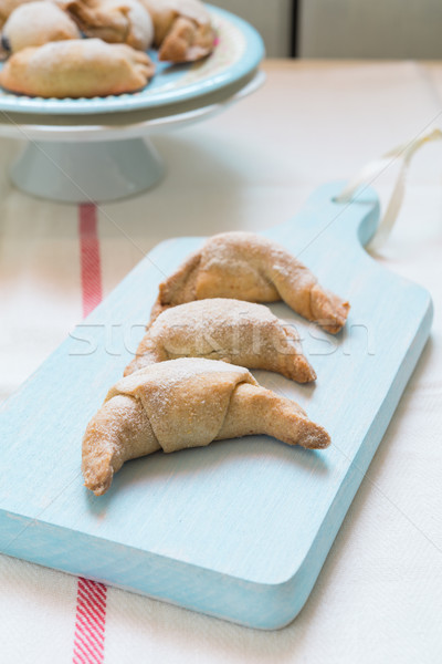 Chocolate filled crescent rolls (croissants) with ice sugar topp Stock photo © rafalstachura