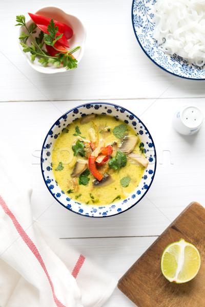 Thai soup with coconut milk and chicken meat on white table Stock photo © rafalstachura