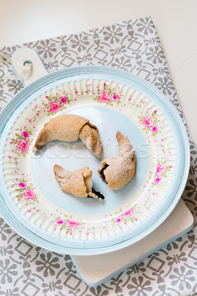 Chocolate filled crescent rolls (croissants) with ice sugar topp Stock photo © rafalstachura