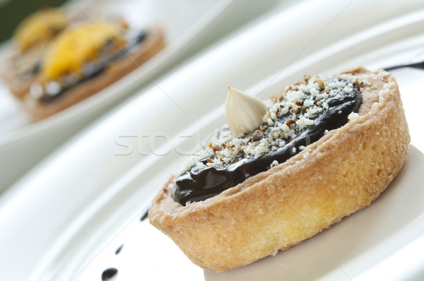 Mini csokoládé torta mogyoró felső háttér Stock fotó © rafalstachura
