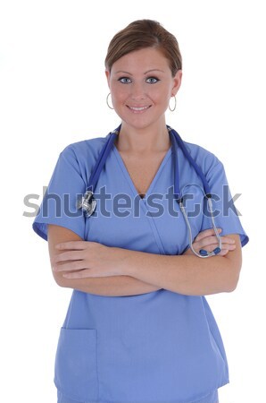 Femeie asistentă prietenos zâmbet în picioare Imagine de stoc © RandallReedPhoto