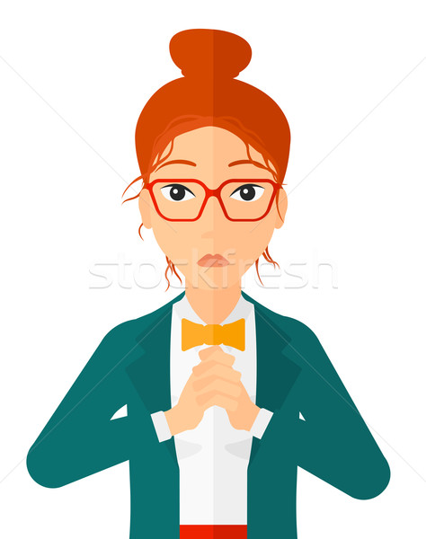 Regretful woman with clasped hands. Stock photo © RAStudio