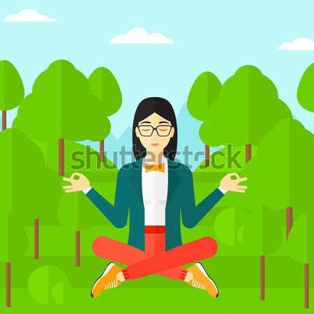 Business woman meditating in lotus pose. Stock photo © RAStudio