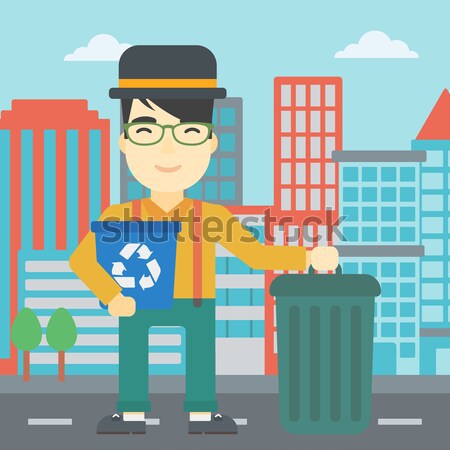 Man with recycle bins. Stock photo © RAStudio